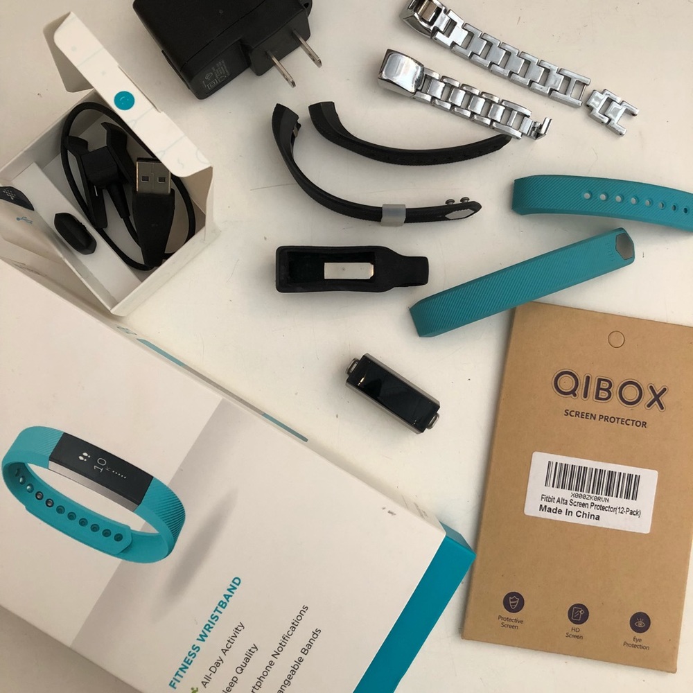 Fitbit Alta with additional bands and chargers